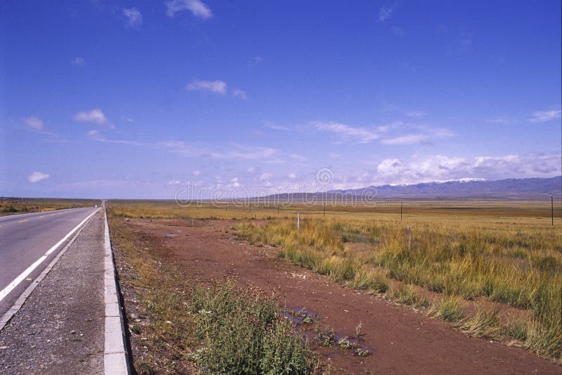 The road to the end, maybe you can see the end, maybe not. it is so straight that like beeline. it is a free feeling.by the way, the road is the QingHai lake cycle track. (use Koda positive film E100vs) See more my images at :). The road to the end, maybe you can see the end, maybe not. it is so straight that like beeline. it is a free feeling.by the way, the road is the QingHai lake cycle track. (use Koda positive film E100vs) See more my images at :)