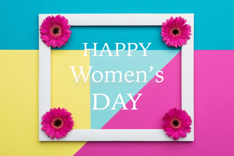 El caramelo en colores pastel de las mujeres del día feliz del ` s coloreó el fondo Tarjeta de felicitación para mujer floral de imagen de archivo