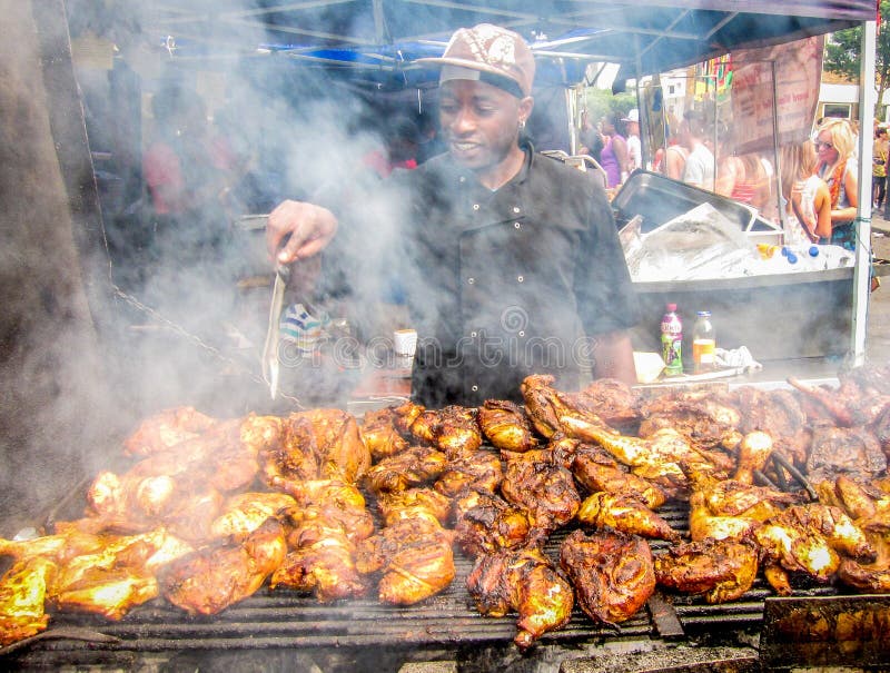 El carnaval de Notting Hill en cocinar del hombre de Londres checken afuera fotografía de archivo libre de regalías