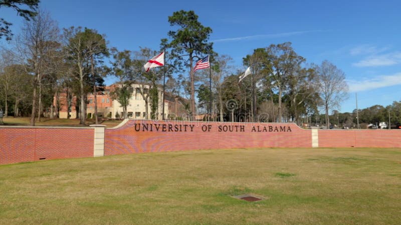 El cartel y banderas de la universidad del sur de alabama en mobile al