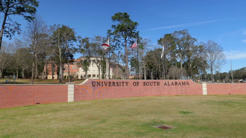 El cartel y banderas de la universidad del sur de alabama en mobile al