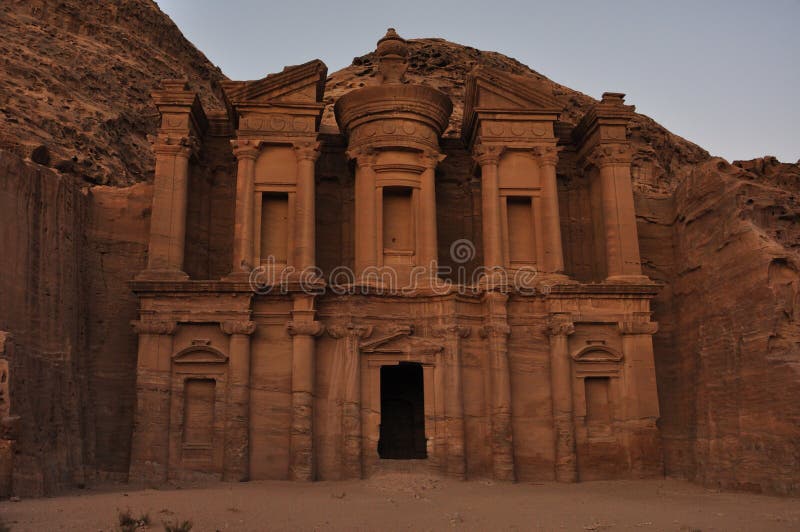 The Monastery, Petra's largest monument, dates from the 1st century BCE. It was dedicated to Obodas I and is believed to be the symposium of Obodas the god. This information is inscribed on the ruins of the Monastery (the name is the translation of the Arabic Ad-Deir). The Monastery, Petra's largest monument, dates from the 1st century BCE. It was dedicated to Obodas I and is believed to be the symposium of Obodas the god. This information is inscribed on the ruins of the Monastery (the name is the translation of the Arabic Ad-Deir).