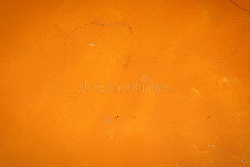 El fondo de un estuco anaranjado cubierto y pintó exterior, el molde áspero del cemento y la textura del muro de cemento, capa rú imagen de archivo libre de regalías El fondo de un estuco anaranjado cubierto y pintó exterior, el molde áspero del cemento y la textura del muro de cemento, capa rú imagen de archivo libre de regalías