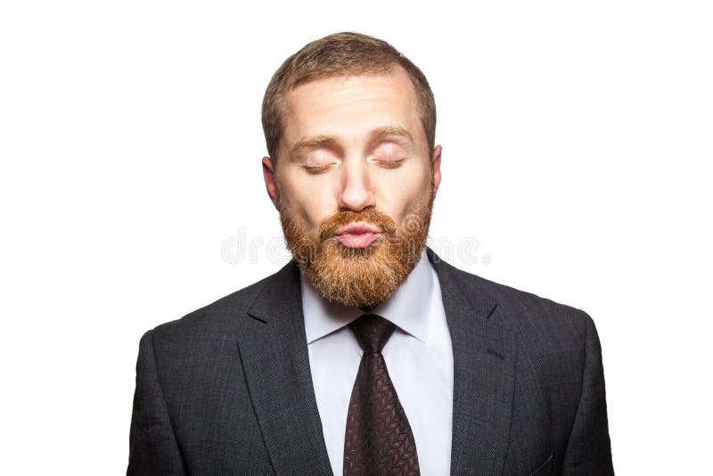 El hombre de negocios envía beso con los ojos clossed imagenes de archivo El hombre de negocios envía beso con los ojos clossed imagenes de archivo