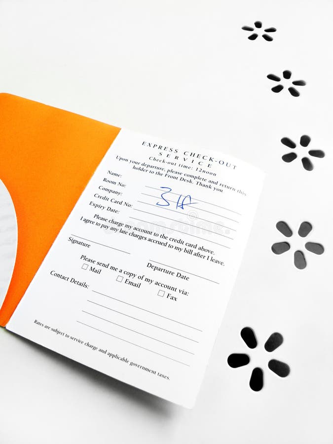 Need a Getaway - An image of a card folder for checking into a hotel or resort. Used for holding access card key and breakfast meal vouchers etc. White and bright orange color theme. With information for express check out service. Taken on clean white background of table with floral pattern. Vertical format. Concept image for rest and relax, take a break, etc. Need a Getaway - An image of a card folder for checking into a hotel or resort. Used for holding access card key and breakfast meal vouchers etc. White and bright orange color theme. With information for express check out service. Taken on clean white background of table with floral pattern. Vertical format. Concept image for rest and relax, take a break, etc.