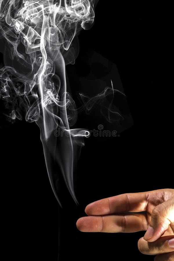 El humo de la extremidad del finger foto de archivo libre de regalías El humo de la extremidad del finger foto de archivo libre de regalías