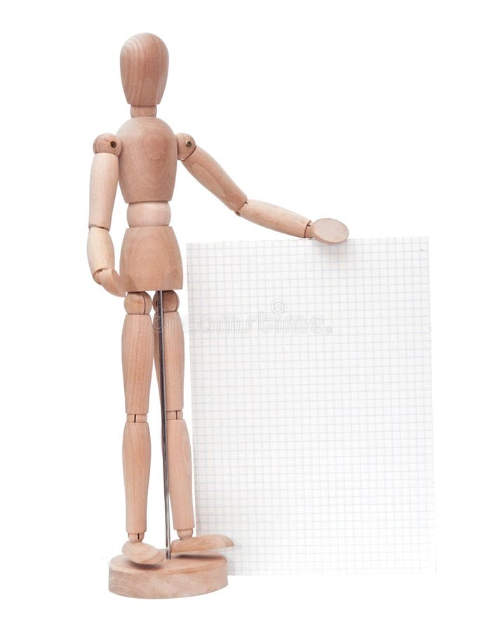 El maniquí de madera sostiene a disposición una hoja del papel en blanco en w imagen de archivo El maniquí de madera sostiene a disposición una hoja del papel en blanco en w imagen de archivo