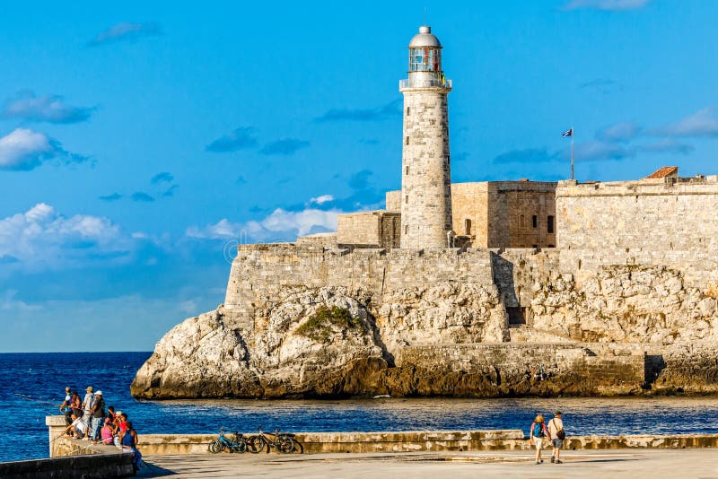 El Morro spanish fortress with lighthouse, cannons and cuban flag in th  foreground, with sea in the background, Havana, Cuba 18835008 Stock Photo  at Vecteezy