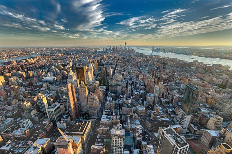 The New York City and New Jersey skyline at afternoon w the Freedom tower and Brooklyn bridge. The New York City and New Jersey skyline at afternoon w the Freedom tower and Brooklyn bridge