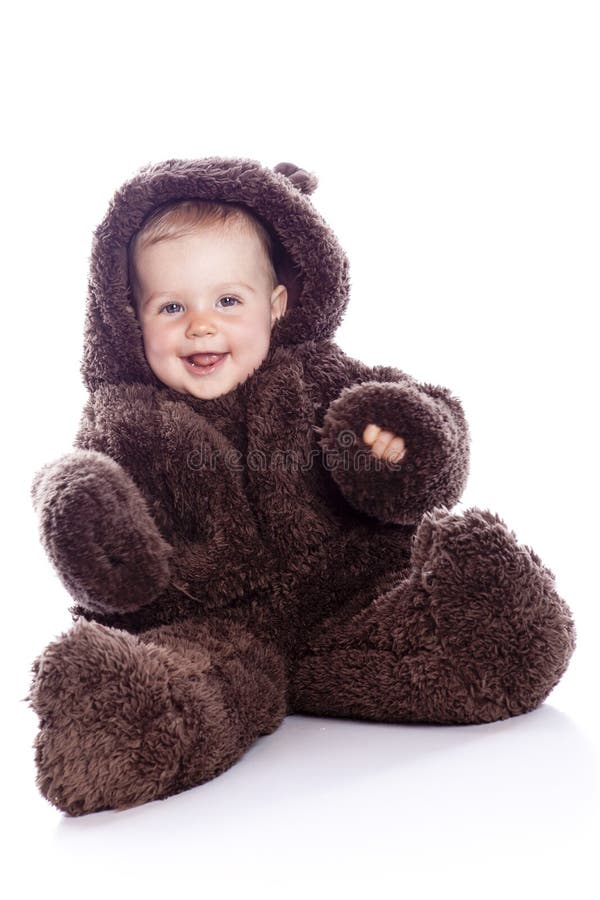 El niño del bebé en peluche-lleva el traje imagen de archivo libre de regalías El niño del bebé en peluche-lleva el traje imagen de archivo libre de regalías