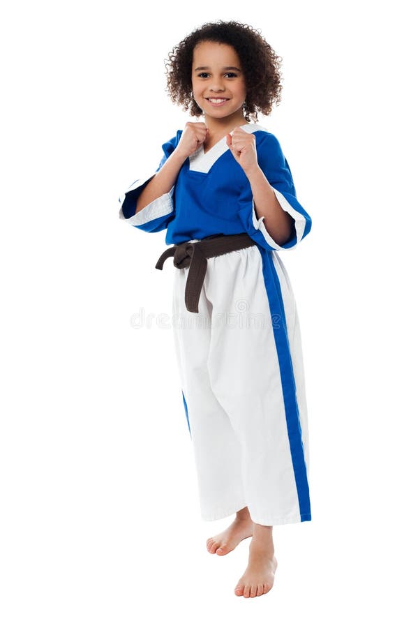 El niño del kung-fu en la acción, consigue listo para más imagen de archivo libre de regalías El niño del kung-fu en la acción, consigue listo para más imagen de archivo libre de regalías