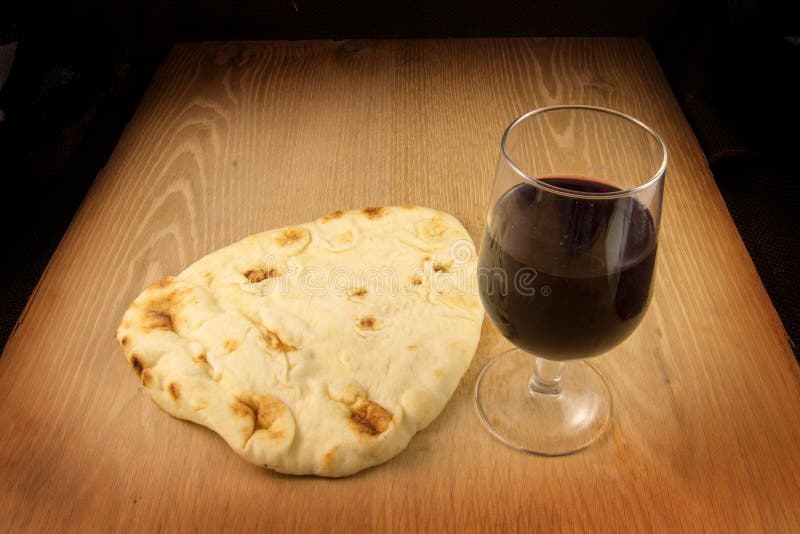 Vino y pan imagen de archivo. Imagen de cristiano, golden 4178283