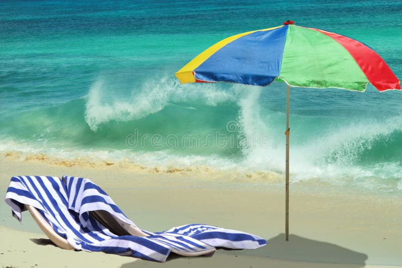 The colorful umbrella, chairs are waiting on the tropical beach. Beautiful foamy wave is crushing down on the sea shore. The sea area is free for your text. The colorful umbrella, chairs are waiting on the tropical beach. Beautiful foamy wave is crushing down on the sea shore. The sea area is free for your text.