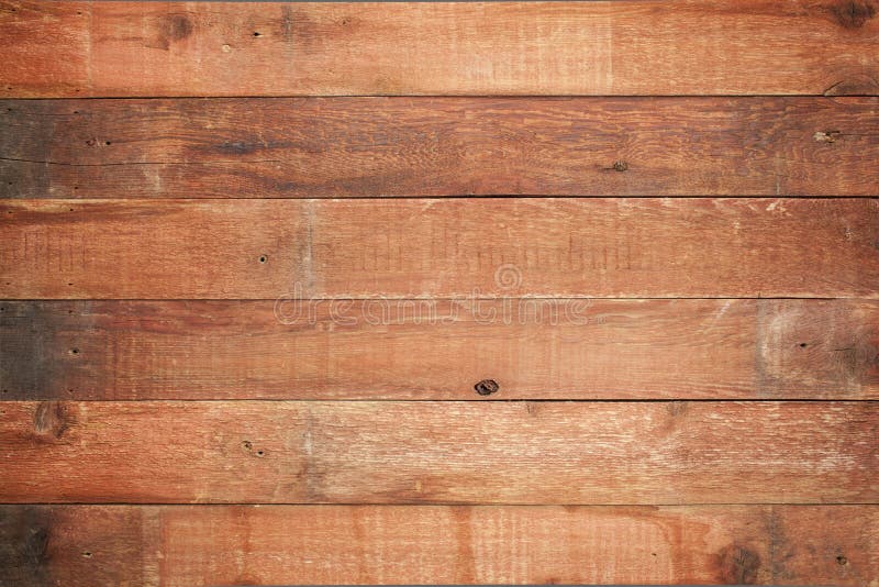 Red weathered barn wood background with knots and nail holes. Red weathered barn wood background with knots and nail holes