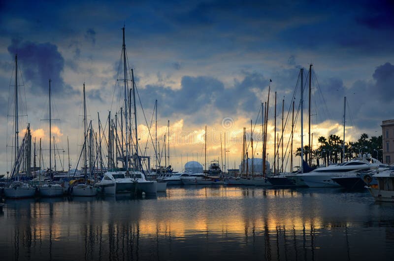 Photo of the sun set over the marina in Cannes. Photo of the sun set over the marina in Cannes