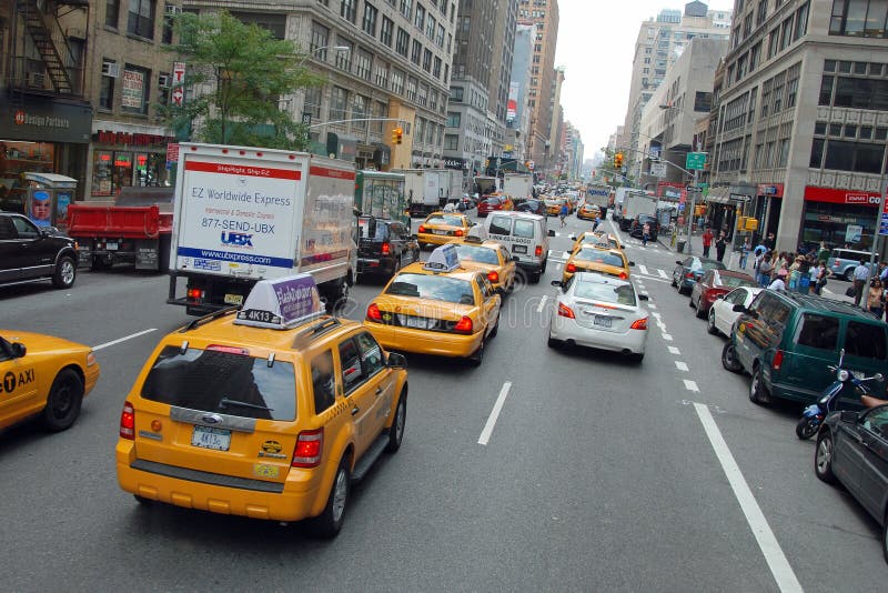 The New York City Taxi, with their distinctive yellow paint are widely recognized icon of the city. The New York City Taxi, with their distinctive yellow paint are widely recognized icon of the city.