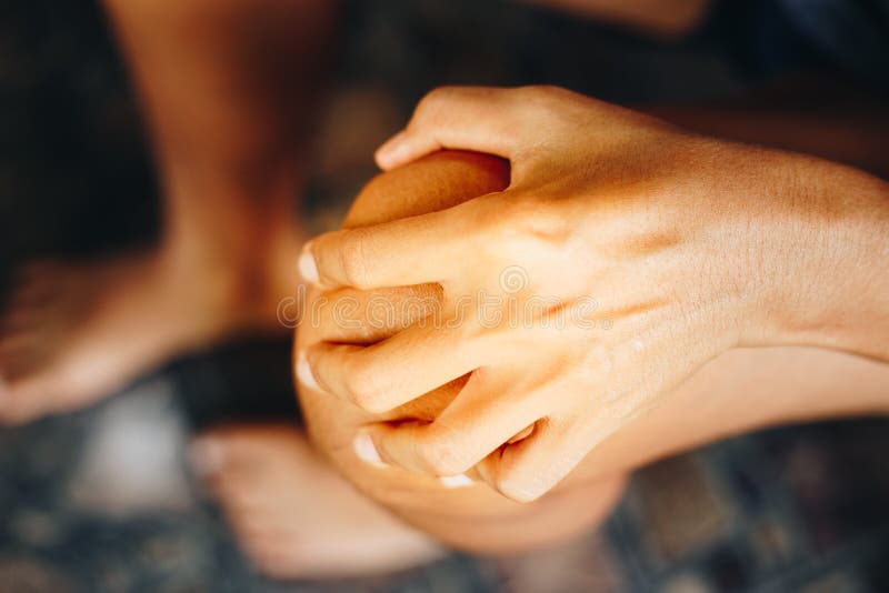 Scabies On Knee Young Women Hand Scratch The Itch  On The Arm Stock Image 