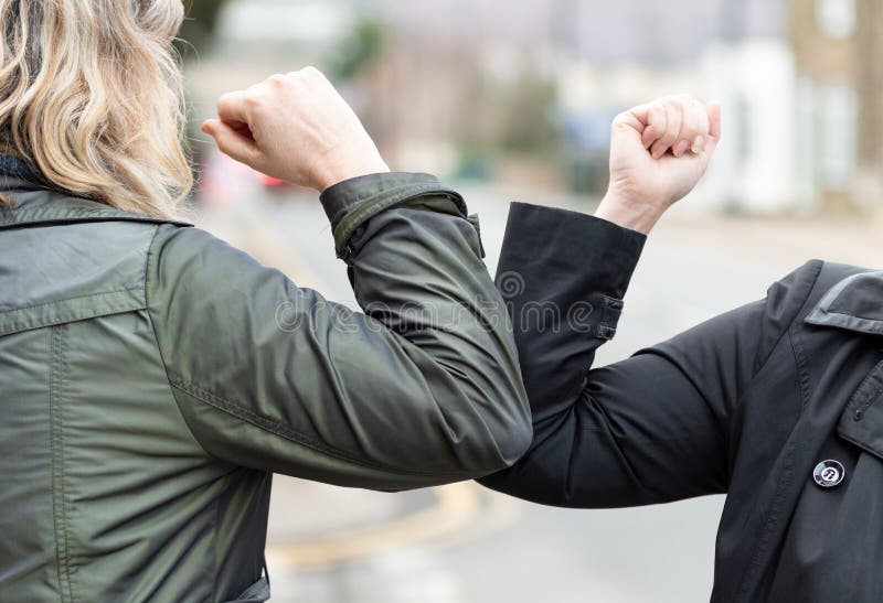 Elbow bump. Novel greeting to avoid spread of coronavirus