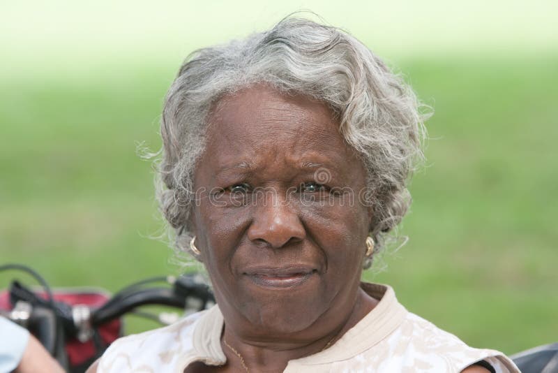 Elderly african american lady outside. Portrait elderly african american lady outside during the day royalty free stock images Elderly african american lady outside. Portrait elderly african american lady outside during the day royalty free stock images