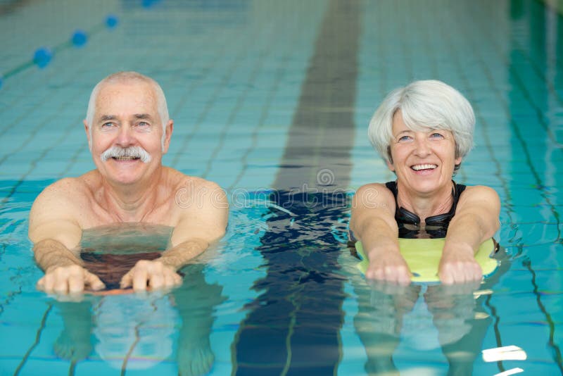 Elderly Couple Doing Swimming Drill Exercises Stock Image Image of