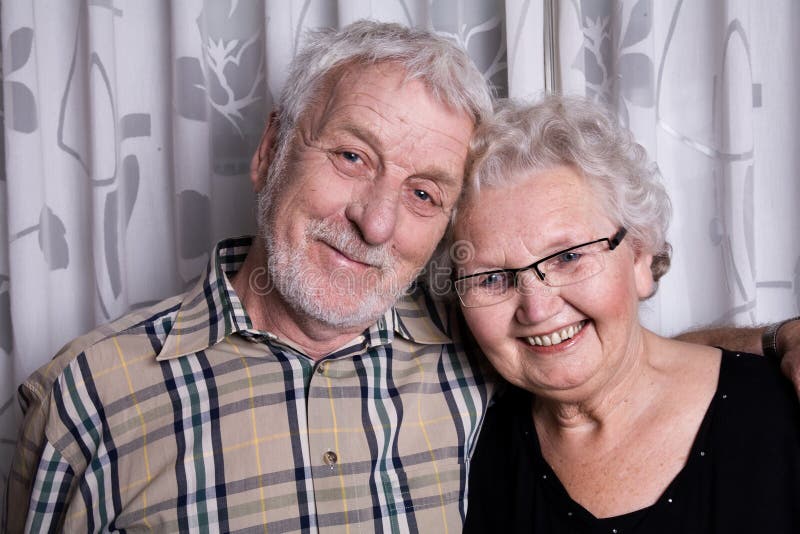 Elderly couple posing