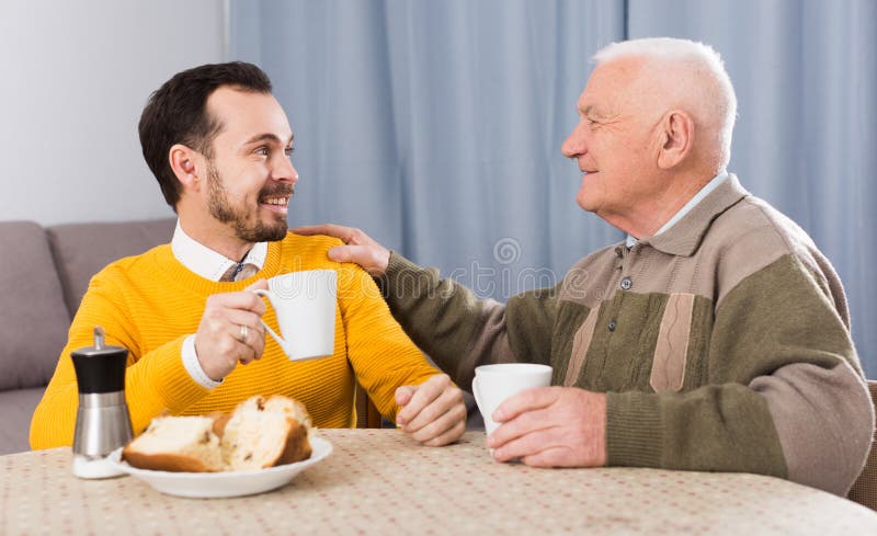 Elderly father and son breakfast royalty free stock photos Elderly father and son breakfast royalty free stock photos
