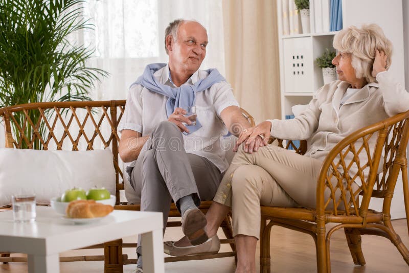 Elderly loving couple holding hands royalty free stock photos Elderly loving couple holding hands royalty free stock photos