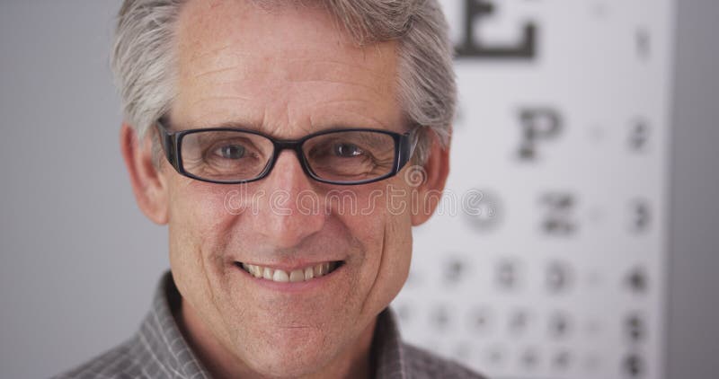 Elderly male wearing prescription glasses stock photography Elderly male wearing prescription glasses stock photography