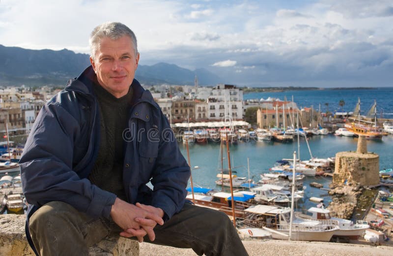 Elderly man against the port of Kyrenia