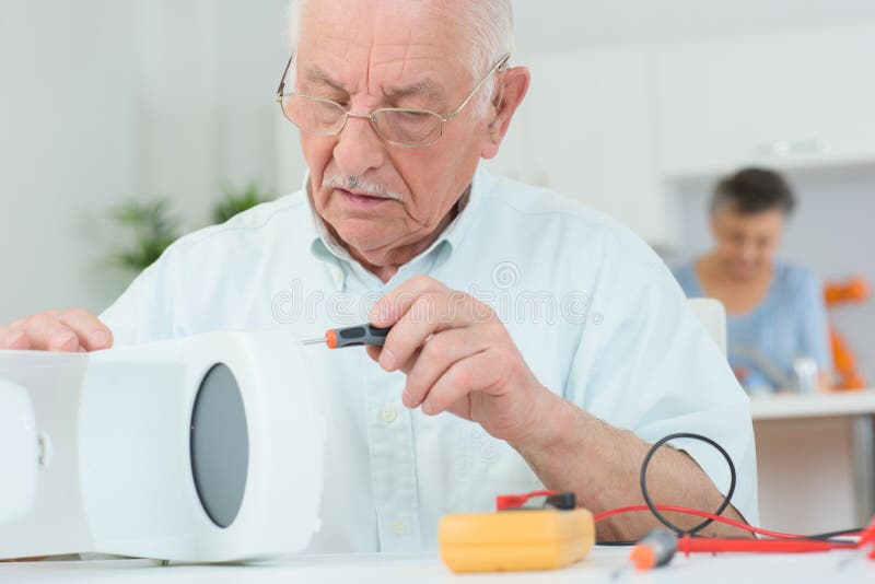 Elderly Man with Coffee Maker Stock Image Image of driver, recyle