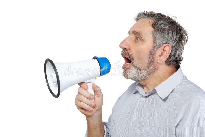 An elderly man says something into a megaphone. An elderly man says something into a megaphone