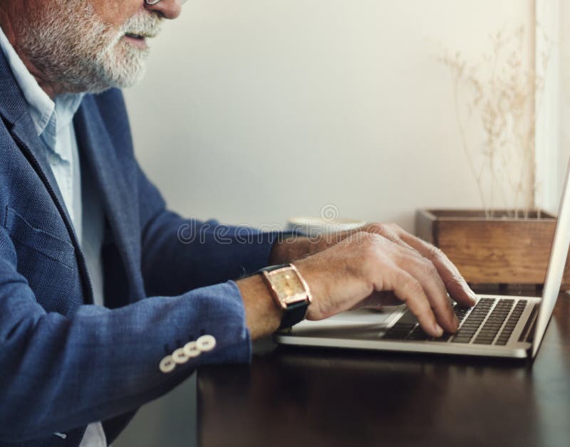 Elderly man is using computer laptop royalty free stock photos Elderly man is using computer laptop royalty free stock photos