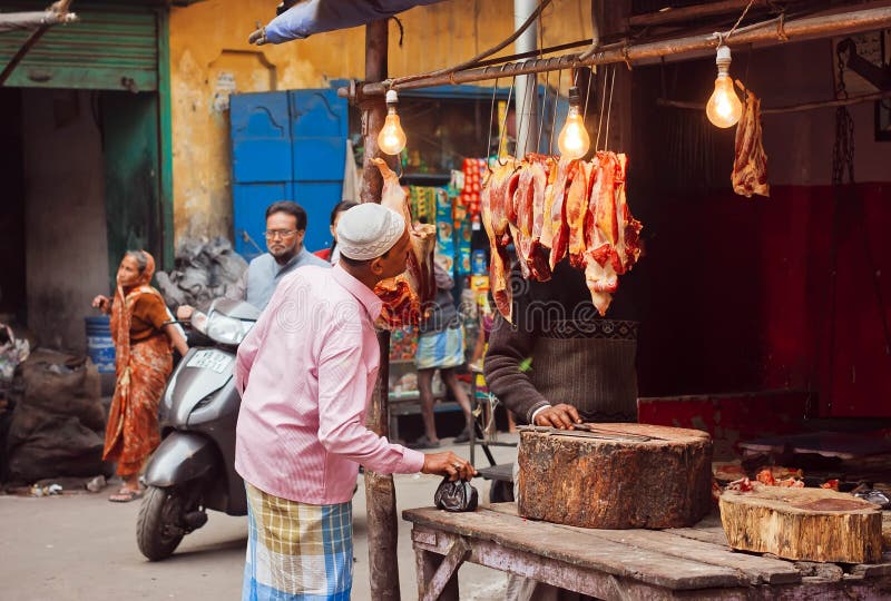 Image of Butcher In a Meat Vending Stall In India-AV635649-Picxy