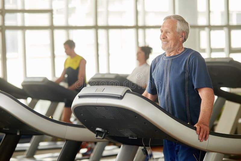 An elderly man is engaged in fitness. stock images An elderly man is engaged in fitness. stock images