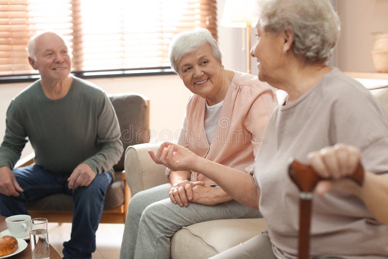 Elderly people spending time in hospice. Senior patients care stock photo Elderly people spending time in hospice. Senior patients care stock photo