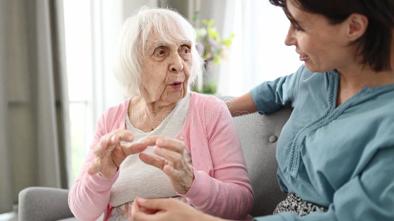 Elderly Woman Chats With Young One, Sharing Her Life Story