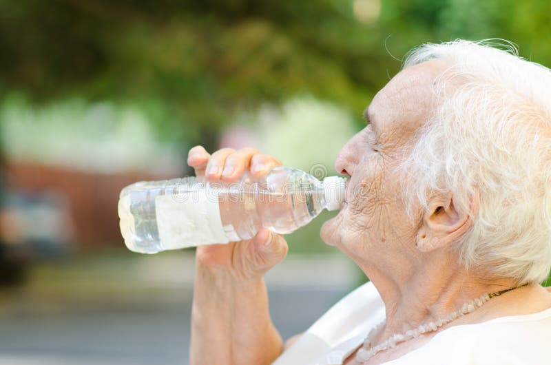 Closeup of Elderly Woman Drinking Water Stock Photo Image of vitamin, closeup 25729282