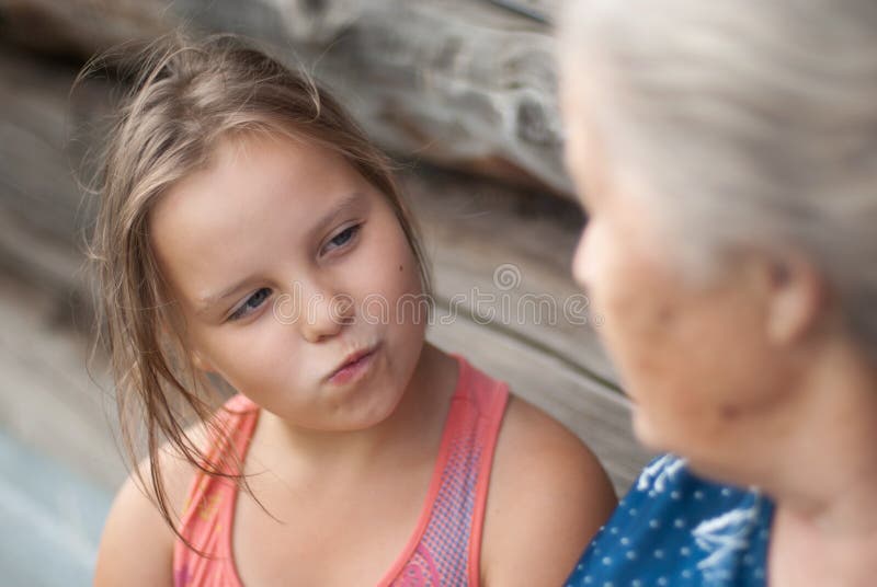 The elderly woman with the grand daughter