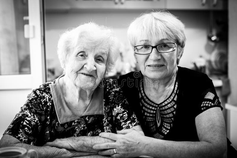 Elderly women in home with his adult daughter. 