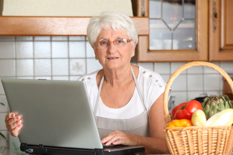 Elderly woman in kitchen