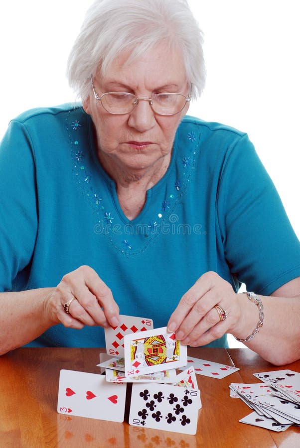 Elderly Woman Making a House with Playing Cards Stock Image Image of