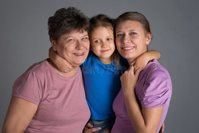 Elderly woman with an older daughter and granddaughter royalty free stock photos Elderly woman with an older daughter and granddaughter royalty free stock photos