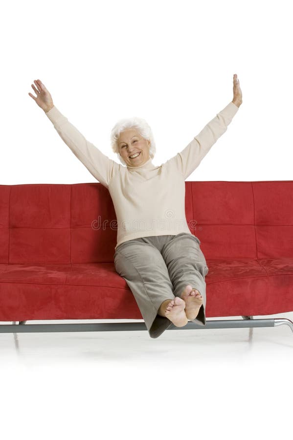 Elderly woman relaxing on the couch