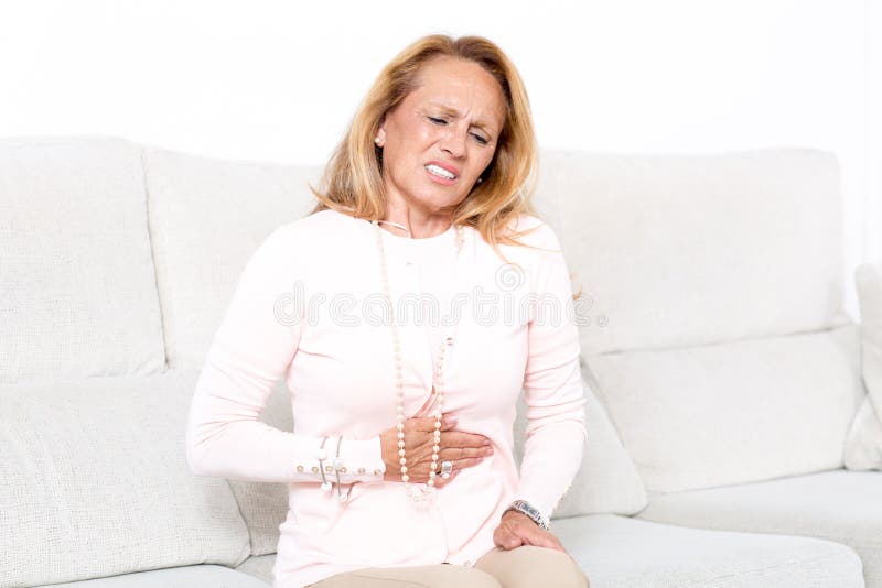 Elderly woman with stomachache