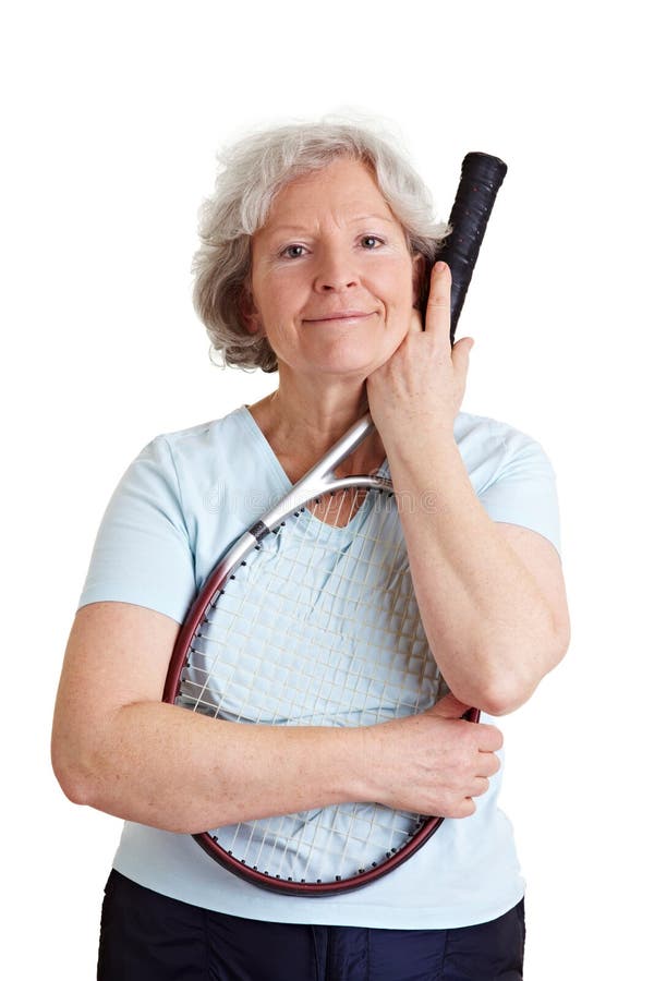 Happy old woman with a tennis racket. Happy old woman with a tennis racket