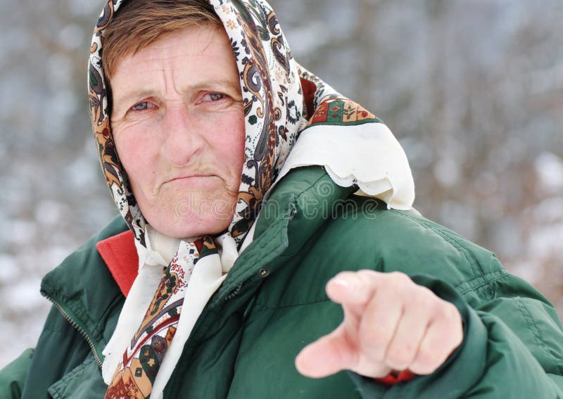 elderly-woman-threating-12992223.jpg