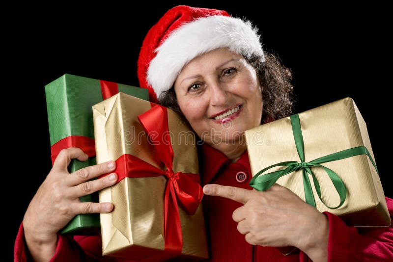 Elderly woman with gifts, Stock image