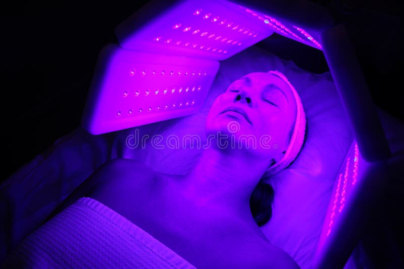 A Woman Receives Laser Treatment Of The Face In A Cosmetology Clinic A Concept Of Skin