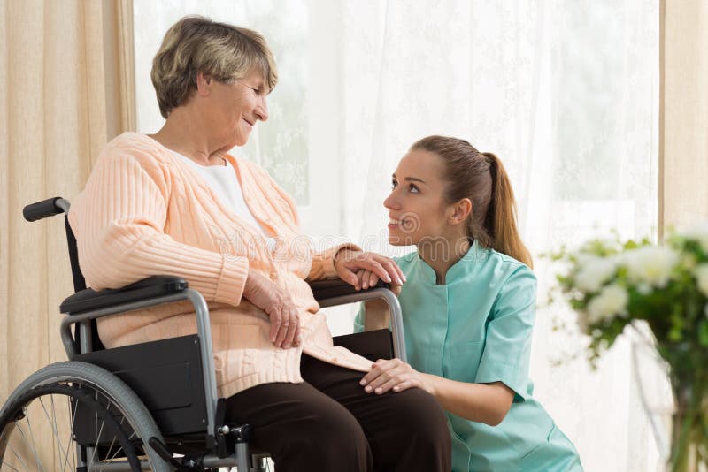 Elderly woman on wheelchair royalty free stock images Elderly woman on wheelchair royalty free stock images