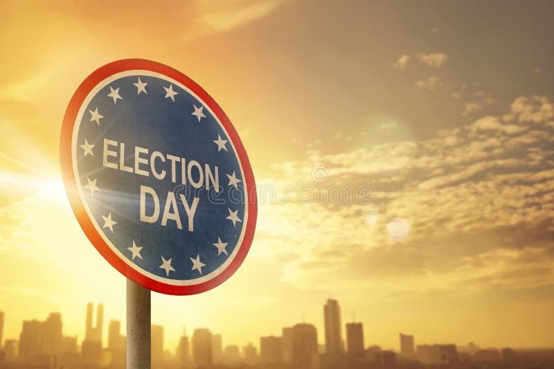 Election day sign with sunset